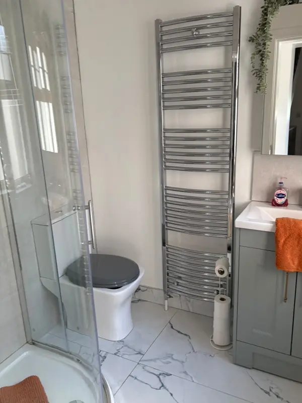 Shower room with polished chrome towel rail, Belfast