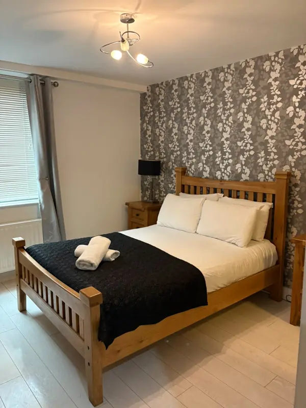 Hotel style bedroom with crisp white linen, Belfast