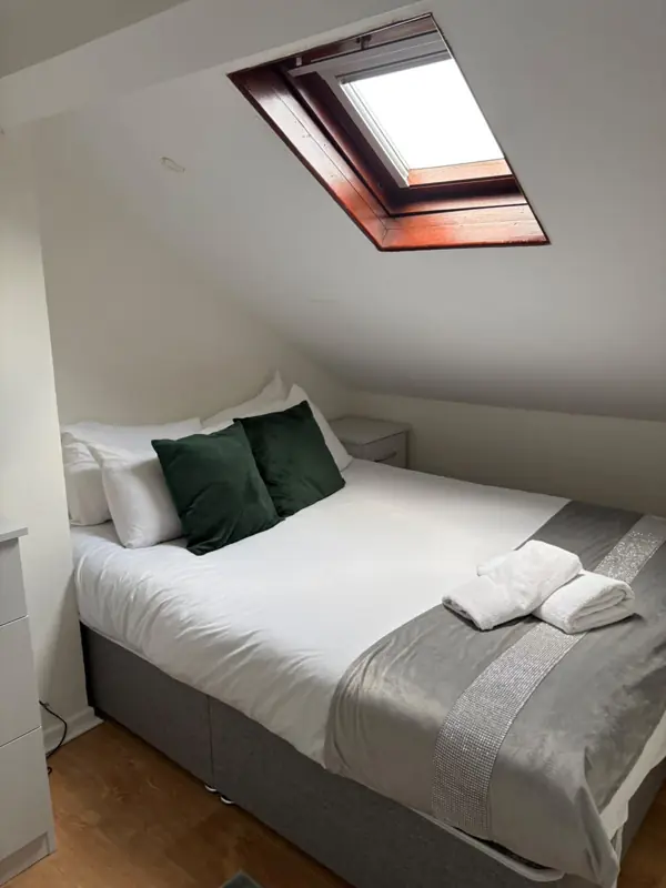 Attic bedroom with fresh linen and towels, Belfast
