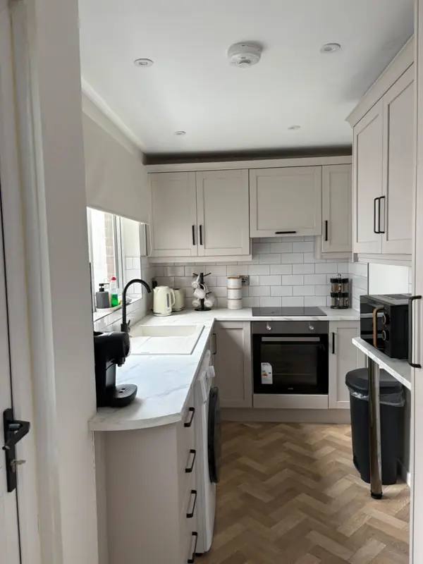 Bright kitchen reset between guests, Belfast