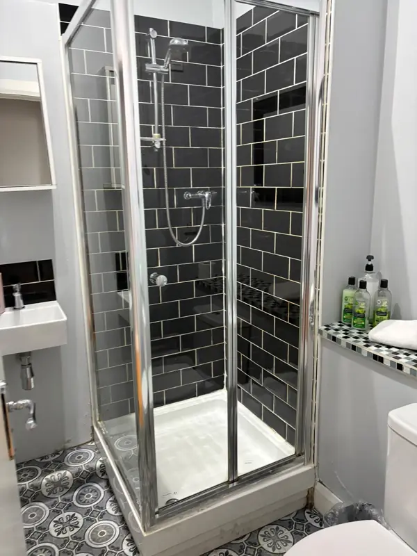 Shower enclosure with clean tiles and glass, Belfast