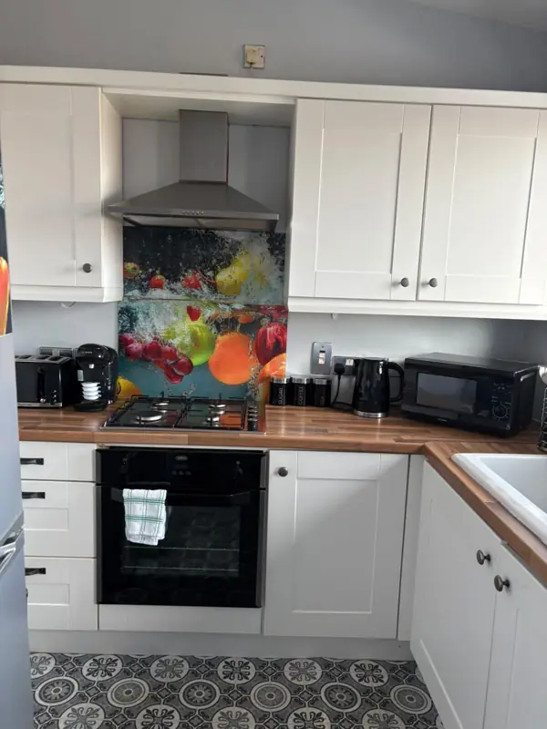 Kitchen cleaned with hob and worktops wiped, Belfast