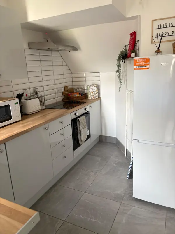 Galley kitchen with spotless floor tiles, Belfast