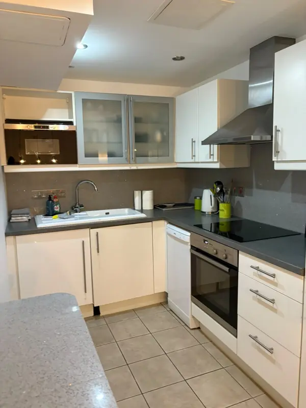 Kitchen with clean hob, oven and worktops, Belfast