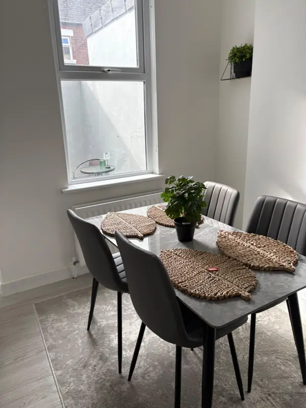 Dining table wiped and ready for guests, Belfast